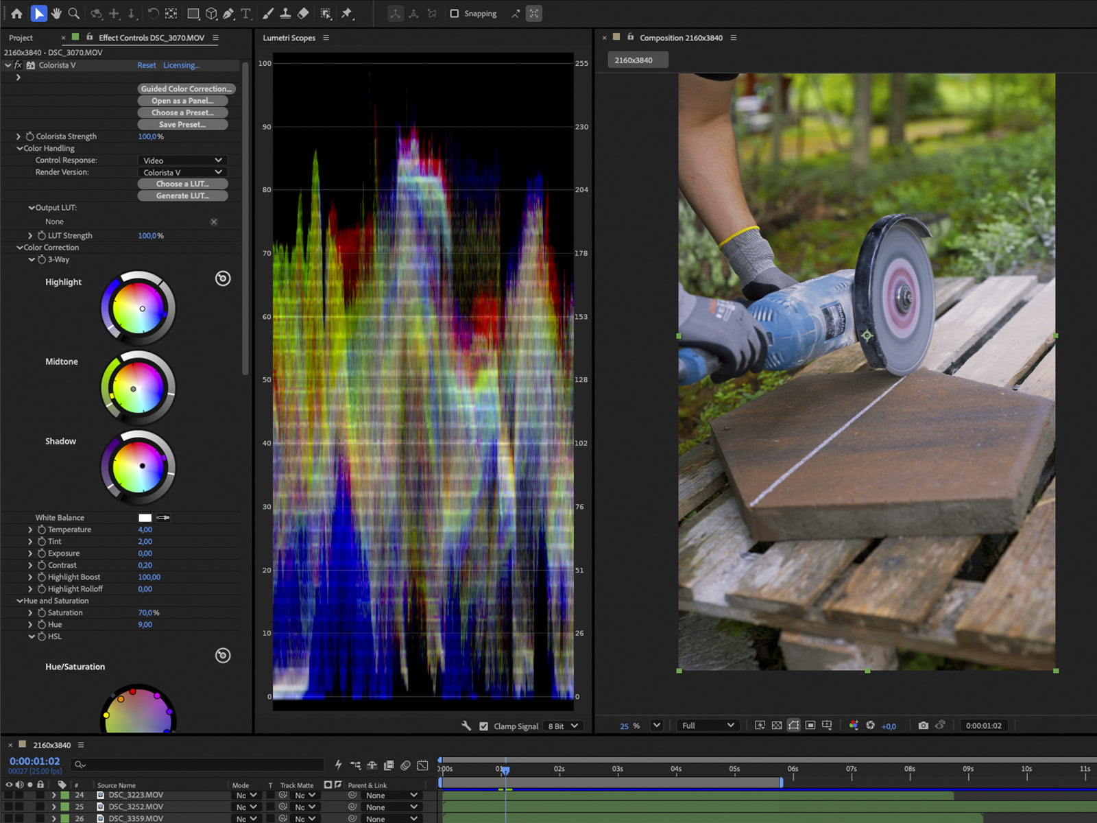 Colour grading in progress in After Effects, with colour wheels, scopes and the graded frame